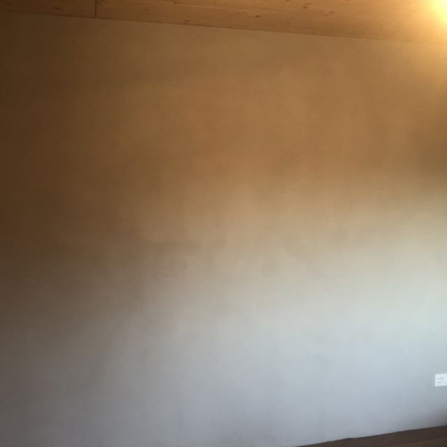 Lehmwand Betonoptik